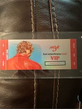 MGK Lost Americana Tour VIP New York City ticket in lucite case.- Red/Blue